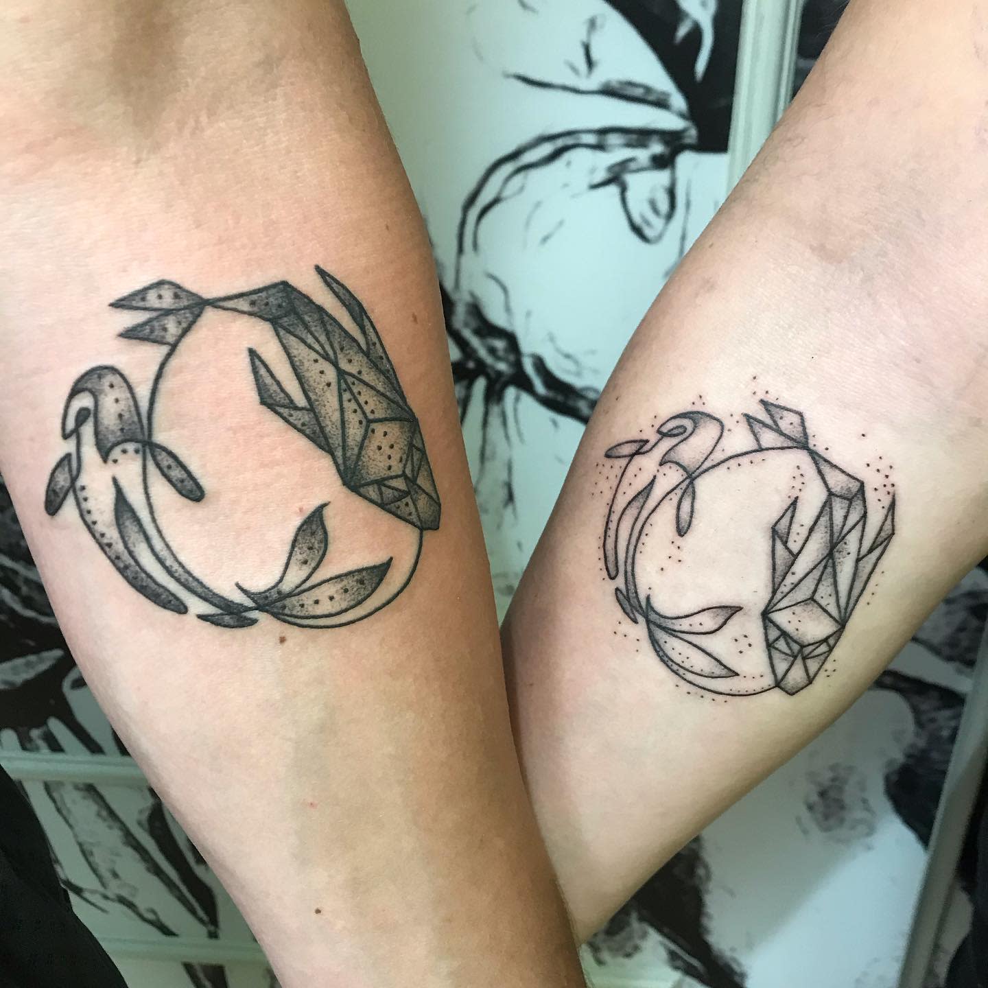 Matching geometric koi fish tattoos in a circular pattern, symbolizing balance, harmony, and interconnectedness